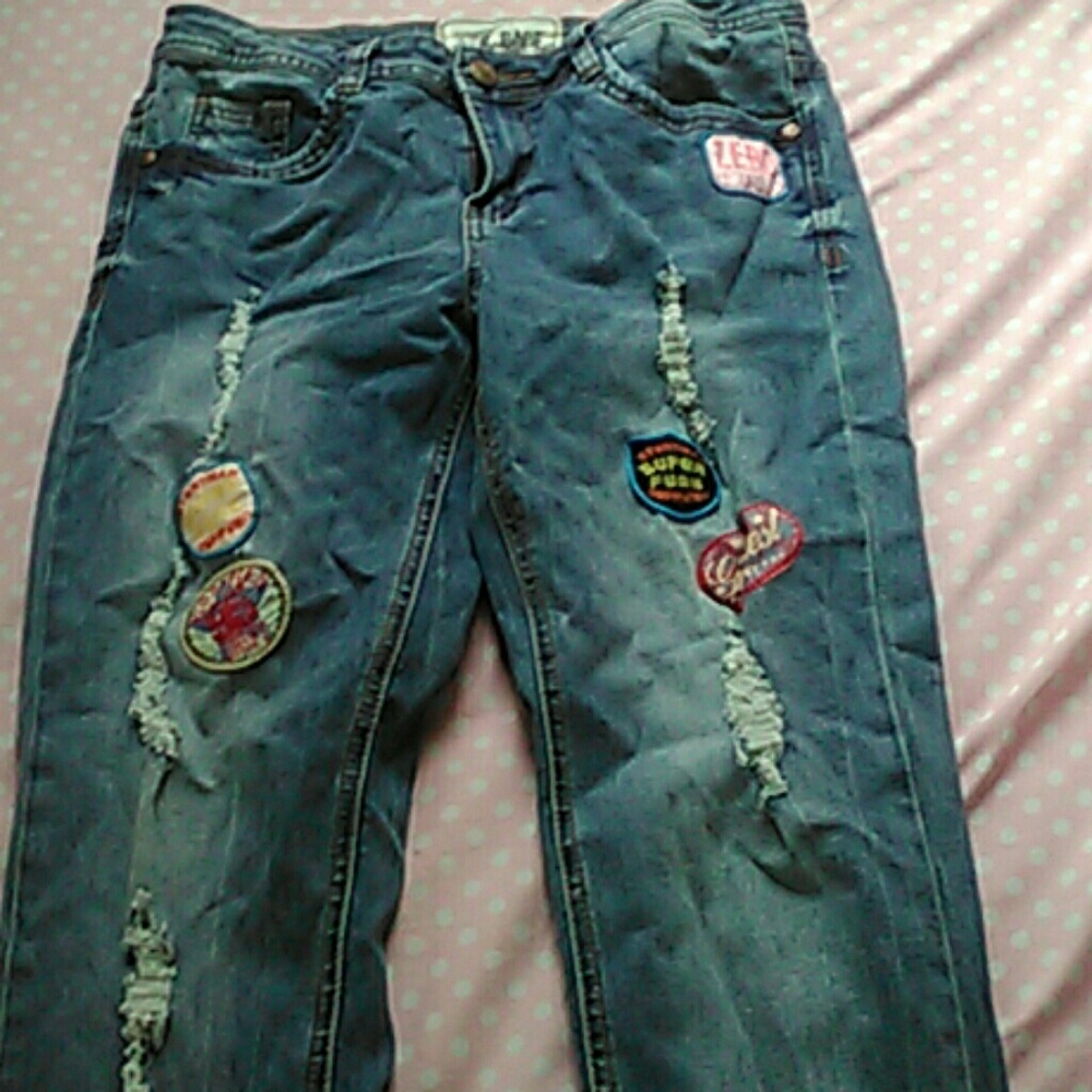 Ripped mom jeans with cute patches